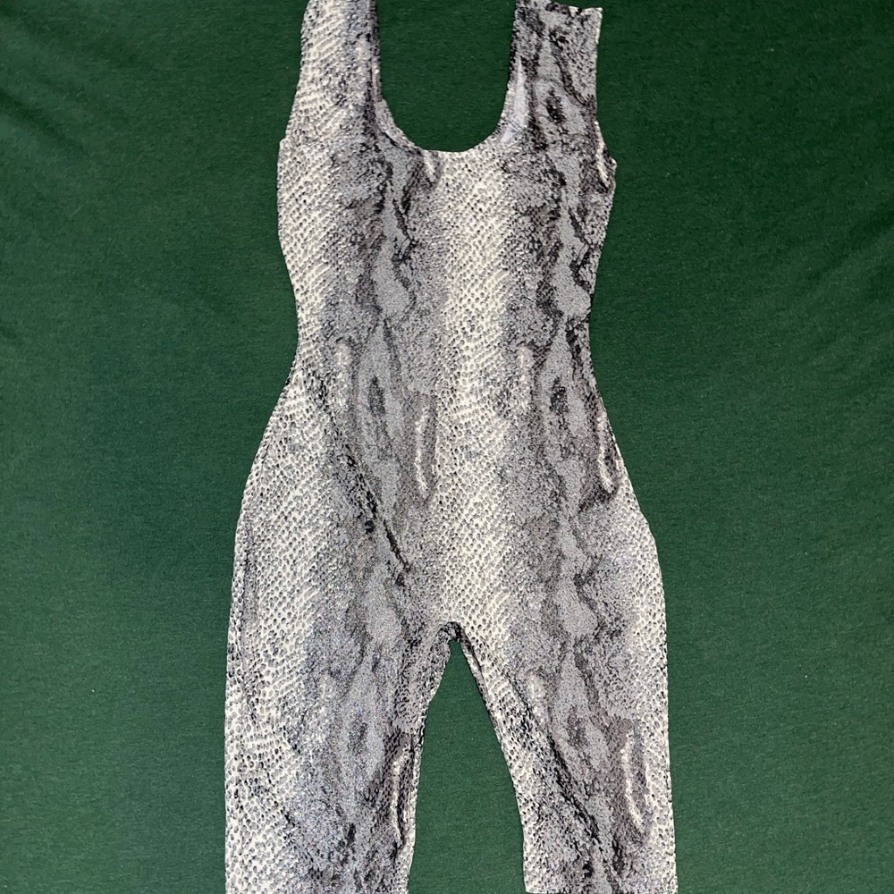 Never worn. Snake skin jumpsuit. OSFM